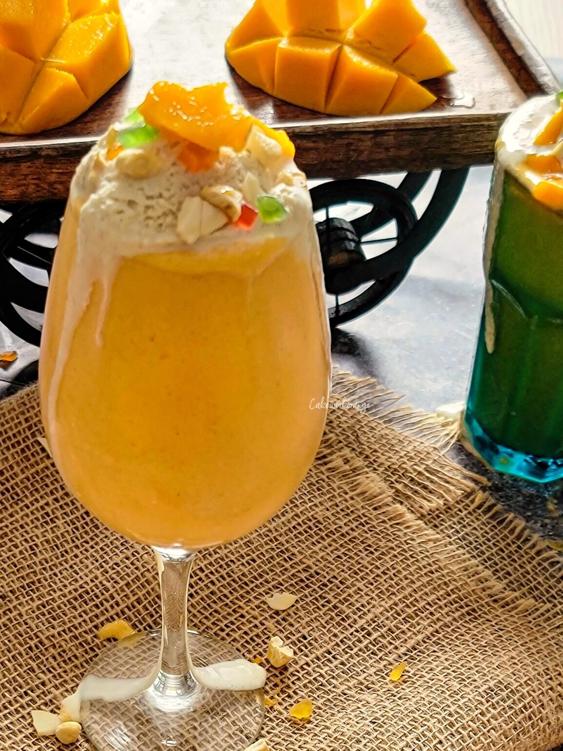 Mango Mastani is a rich and delicious summer drink, that originated in India. It is nothing but a thick mango milkshake topped with ice cream, nuts and cut mango pieces. 
