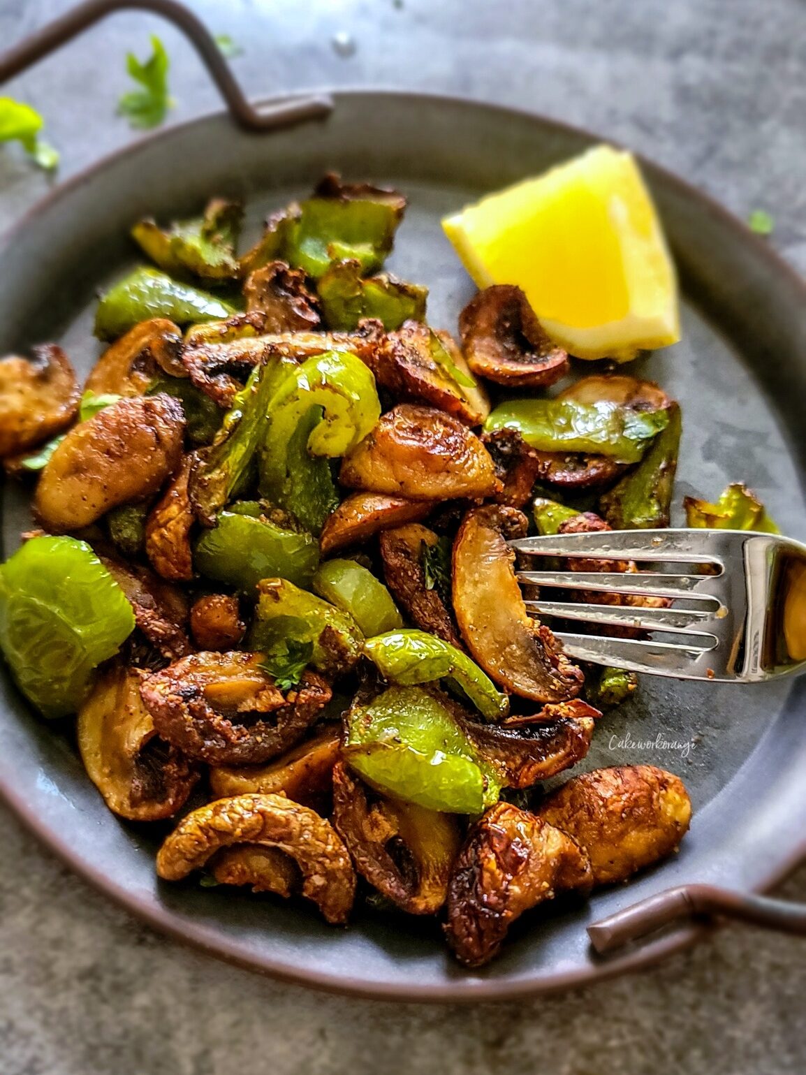 Perfectly cooked air fryer pepper mushrooms served as an appetizer. 