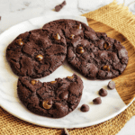 Easy and rich eggless chocolate brownie cookies with chocolate chips served for snack